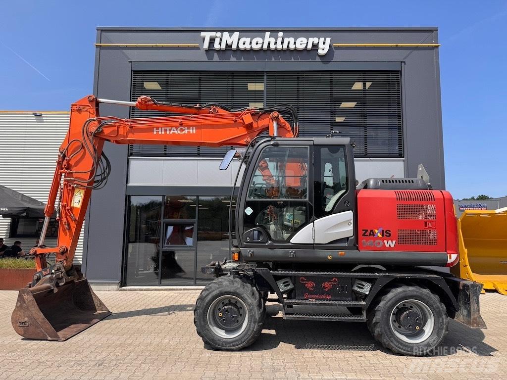 Hitachi 140W حفارات بعجل