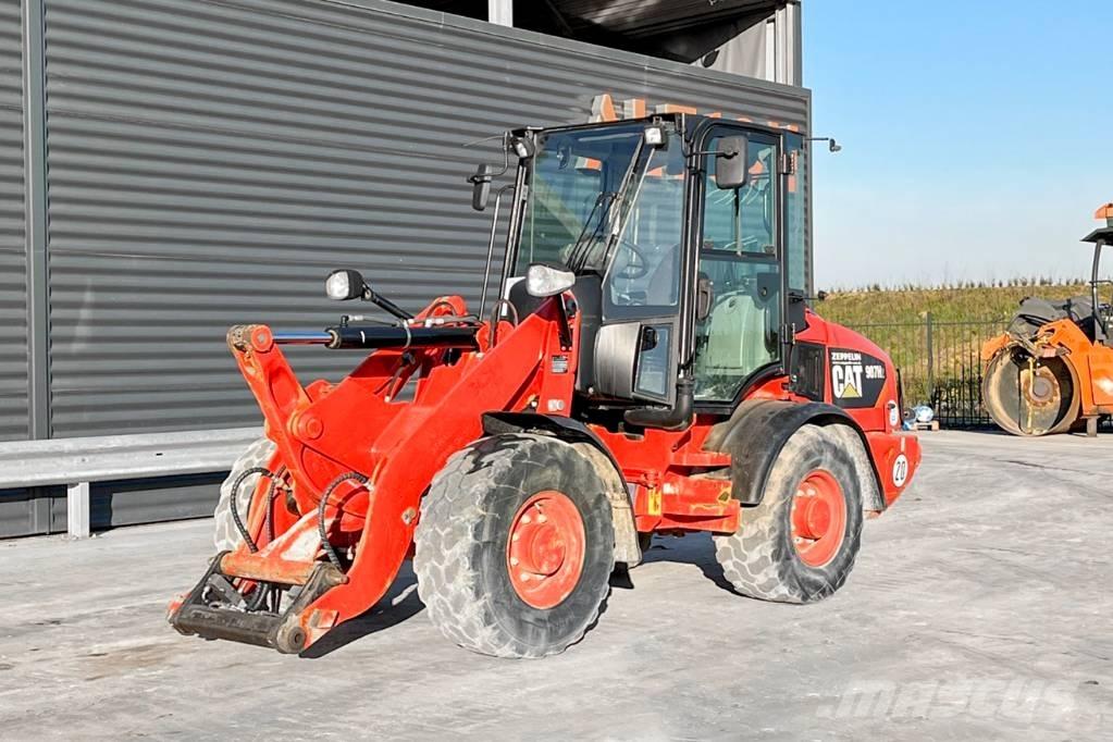 CAT 907H2 لوادر بعجل