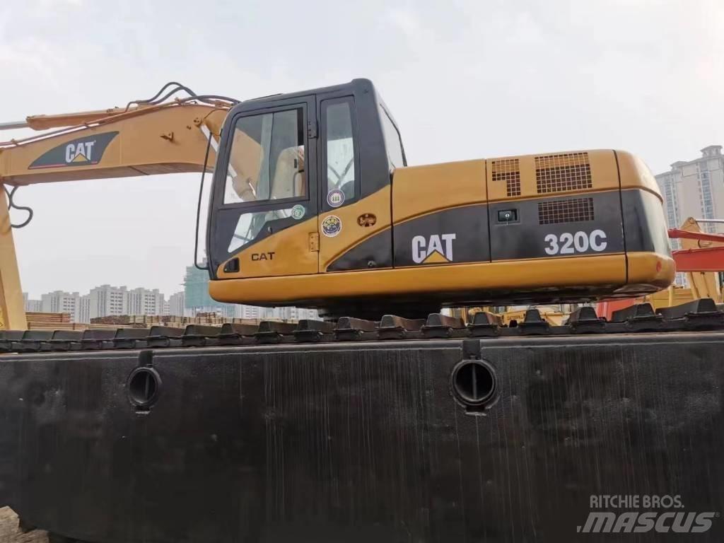 CAT 320 C حفارات زحافة