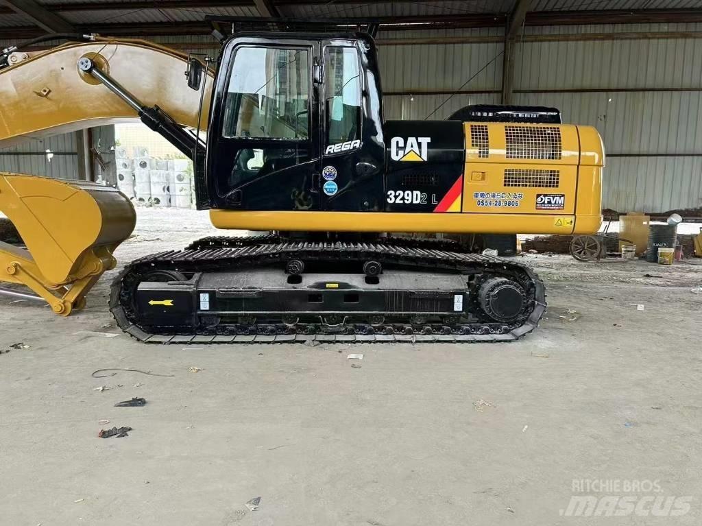 CAT 329 D L حفارات زحافة