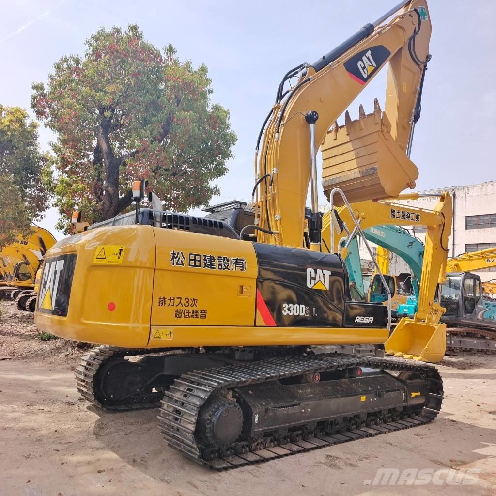 CAT 324 D L حفارات زحافة
