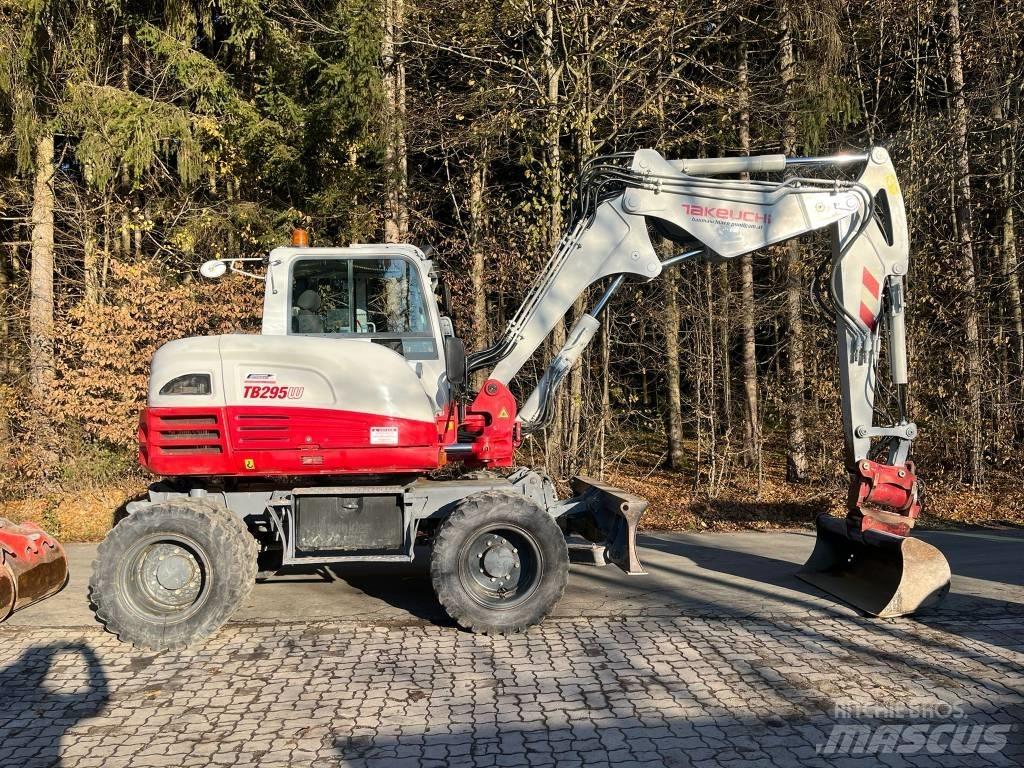 Takeuchi TB295W حفارات بعجل