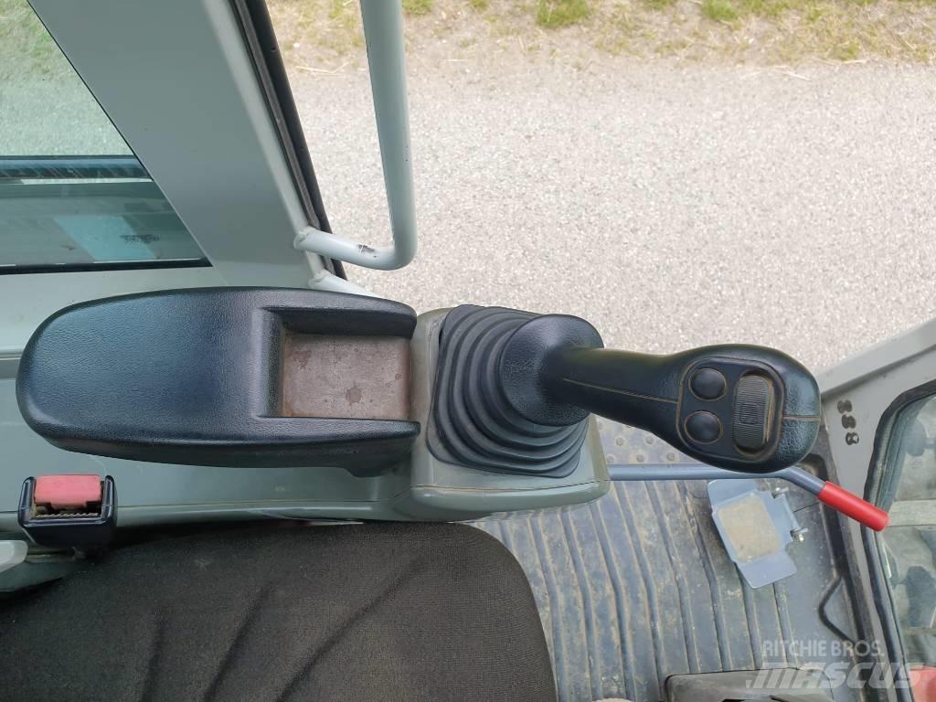 Takeuchi TB295W حفارات بعجل