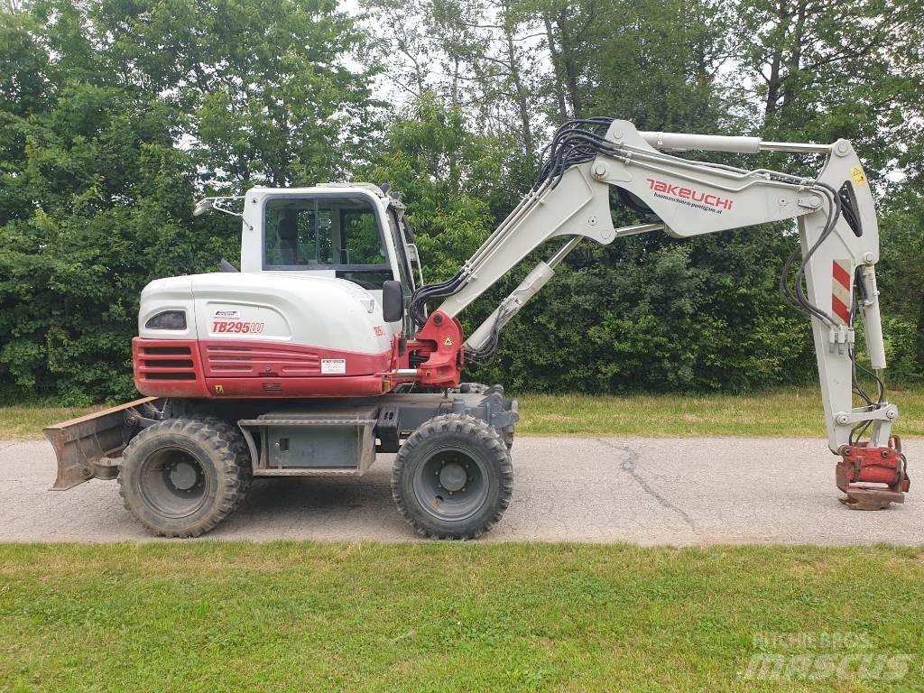 Takeuchi TB295W حفارات بعجل