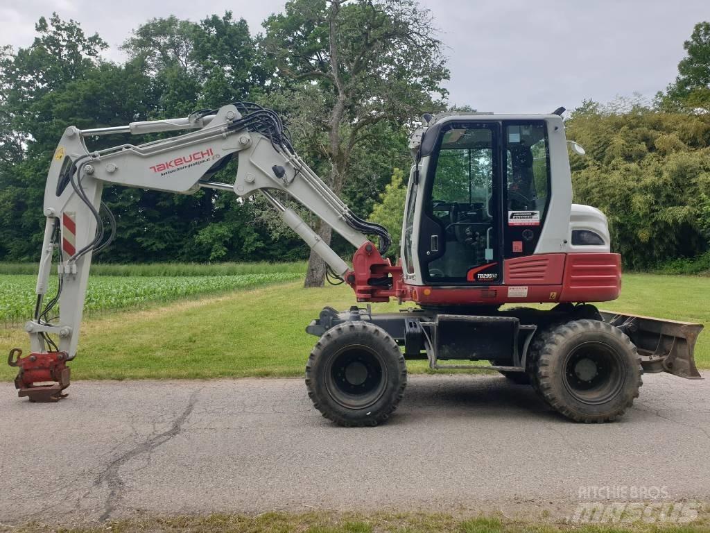 Takeuchi TB295W حفارات بعجل