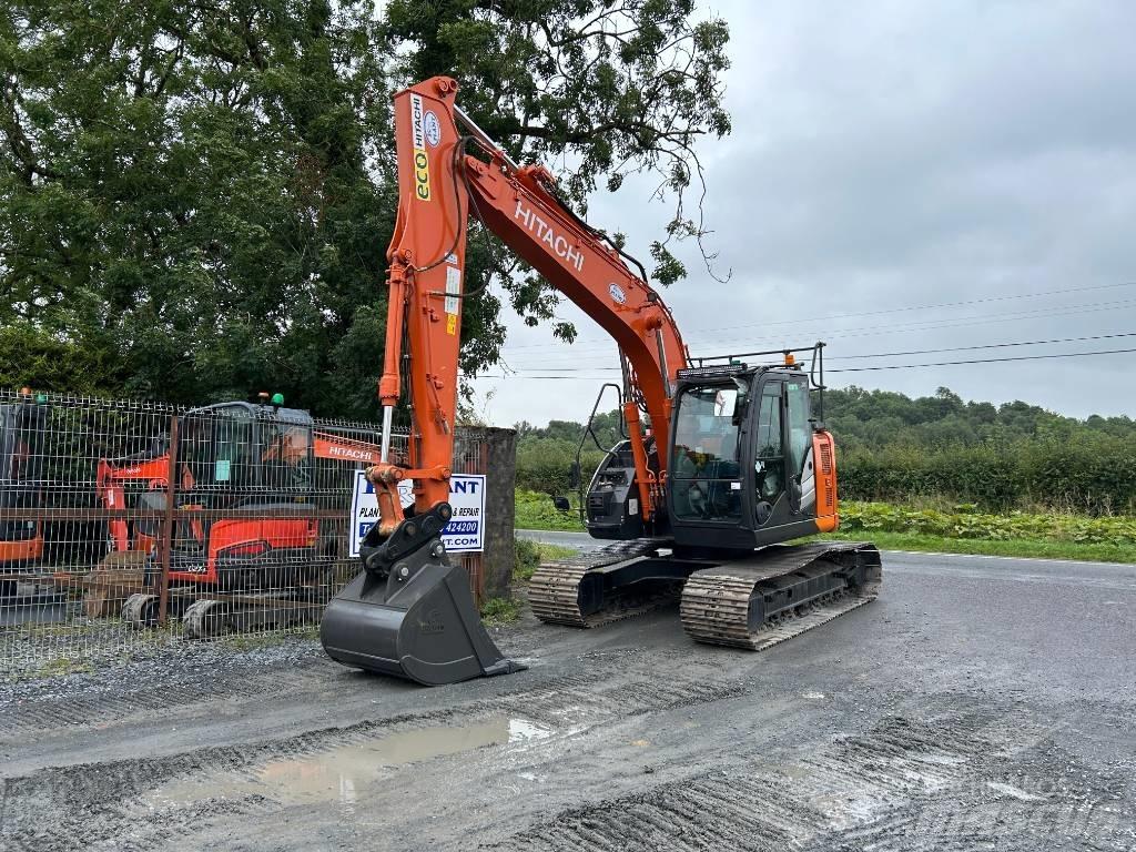 Hitachi ZX 135 US-6 حفارات زحافة