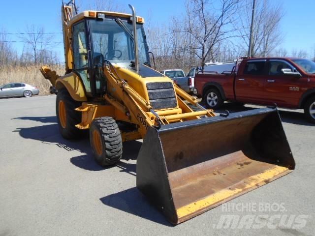 New Holland 575 E لوادر ذات جرافات عكسية