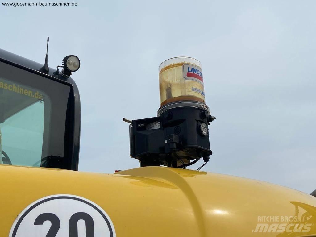 Yanmar B 110 W حفارات بعجل