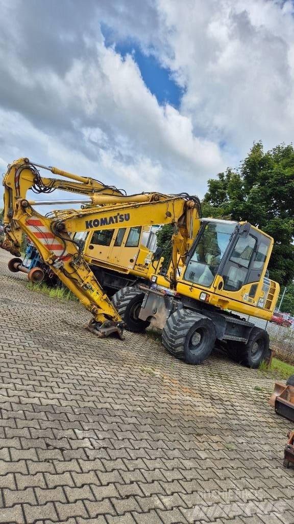Komatsu PW148-8 حفارات بعجل