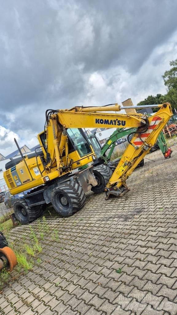 Komatsu PW148-8 حفارات بعجل