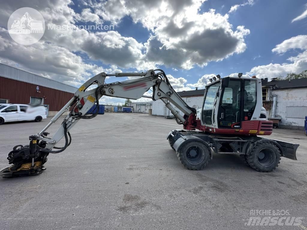 Take-Job TB 295 W حفارات بعجل