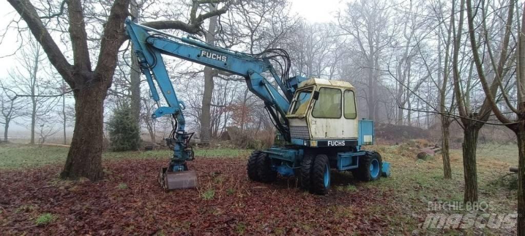 Fuchs F 712 حفارات بعجل