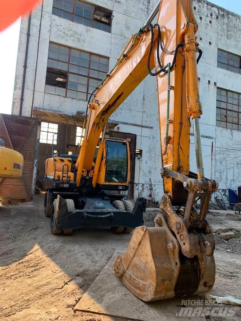 Hyundai R210W-9 حفارات بعجل