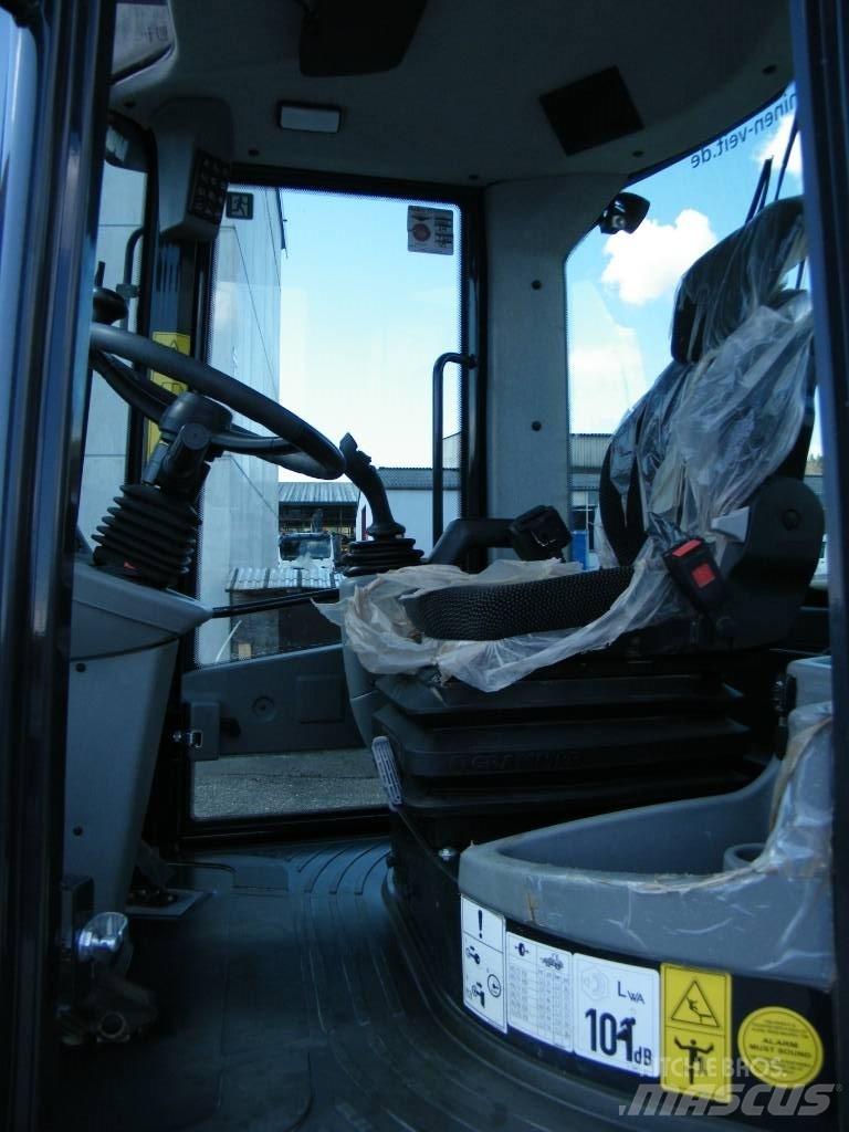 Yanmar v100 لوادر بعجل