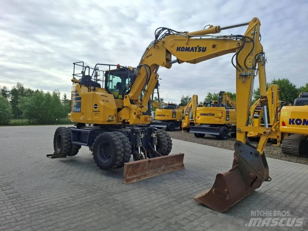 Komatsu PW 118MR-11 حفارات بعجل
