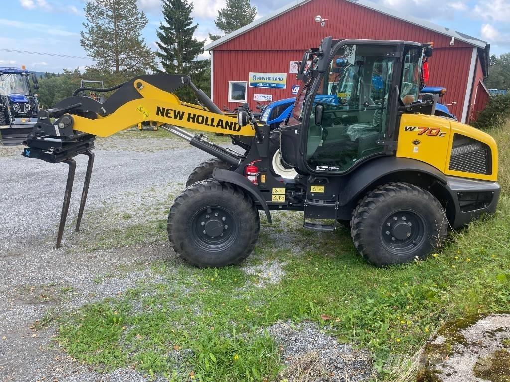 New Holland W70C لوادر بعجل