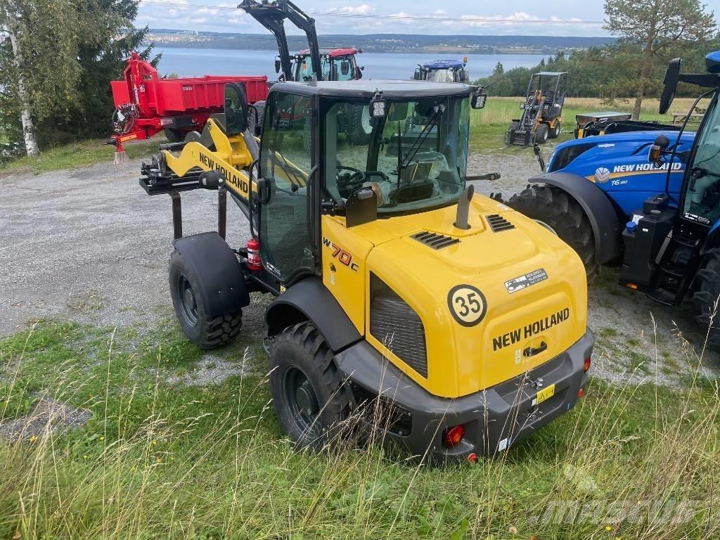 New Holland W70C لوادر بعجل