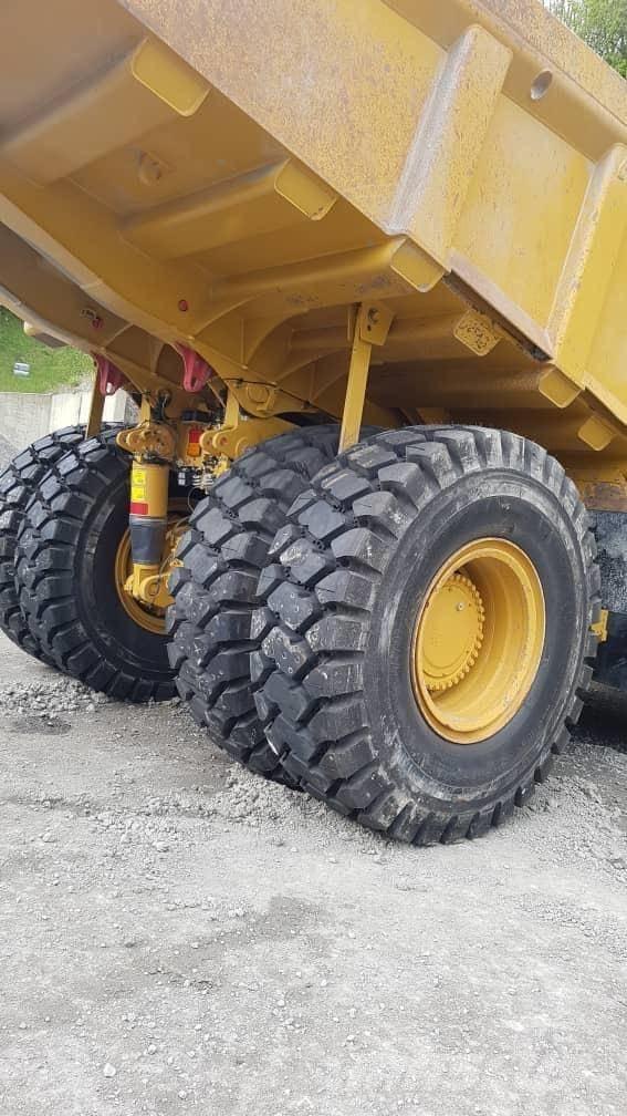 CAT 775 G شاحنات المخلفات الصلبة