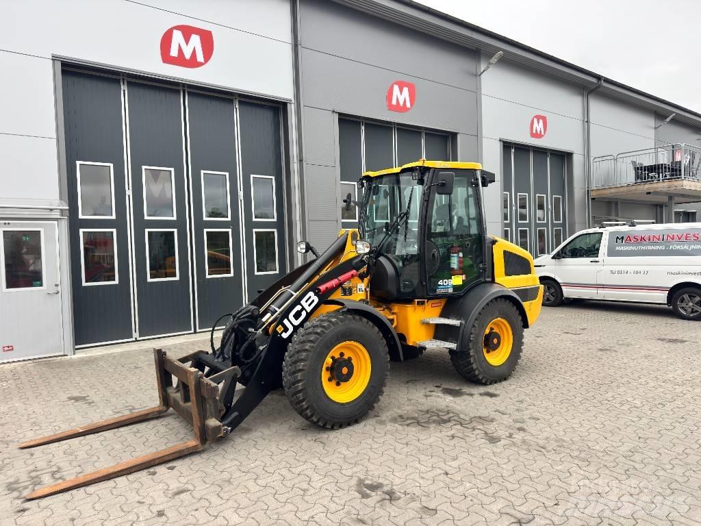 JCB 409 لوادر بعجل