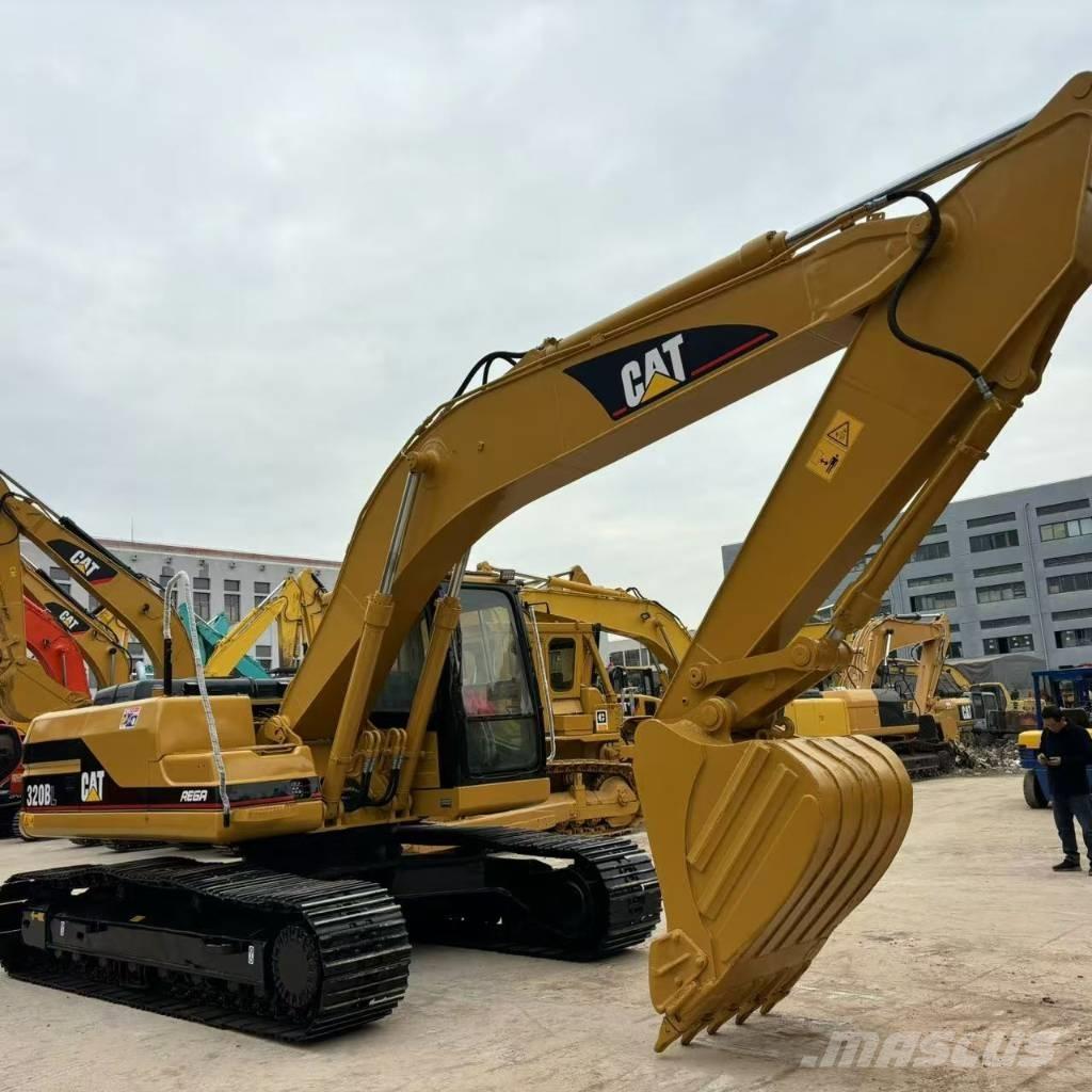 CAT 320BL حفارات زحافة