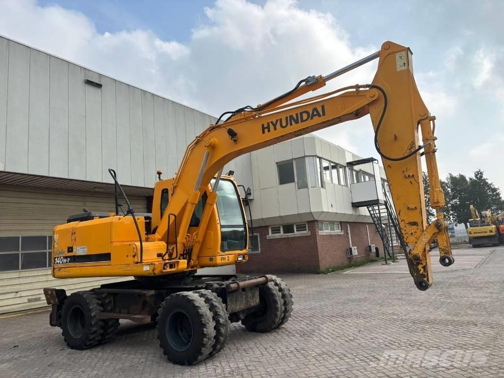 Hyundai 140W-7 حفارات بعجل