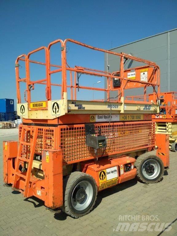 JLG M 4069 رافعات مقصية الشكل