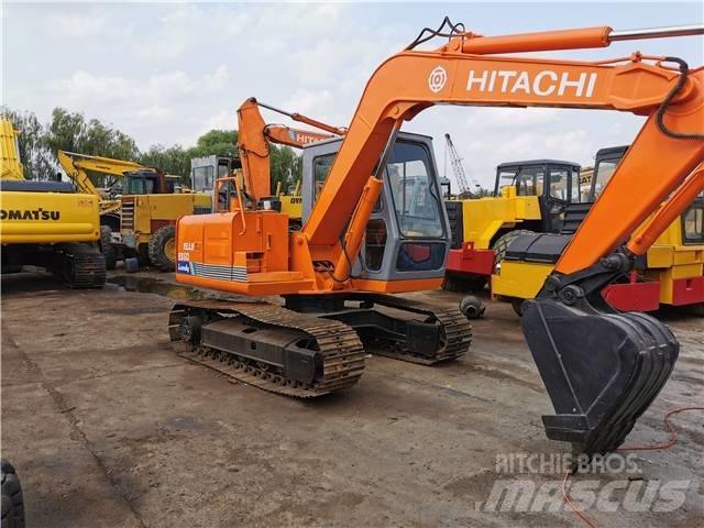 Hitachi EX60 حفارات زحافة