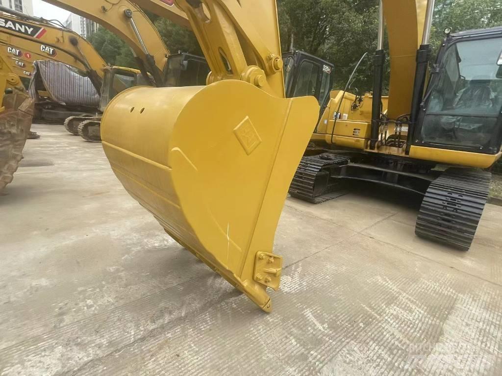CAT 2021 CAT 323Gx حفارات بعجل