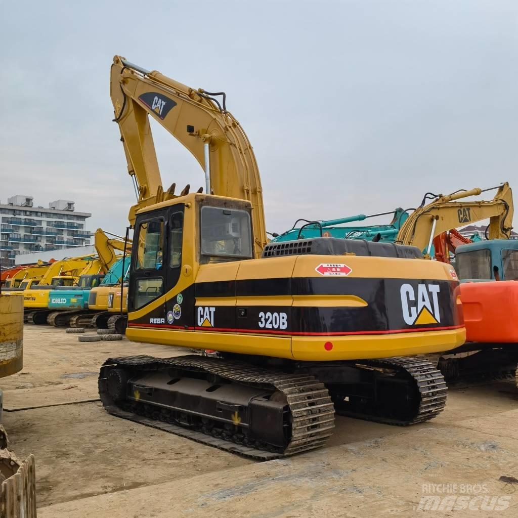 CAT 320 B حفارات زحافة