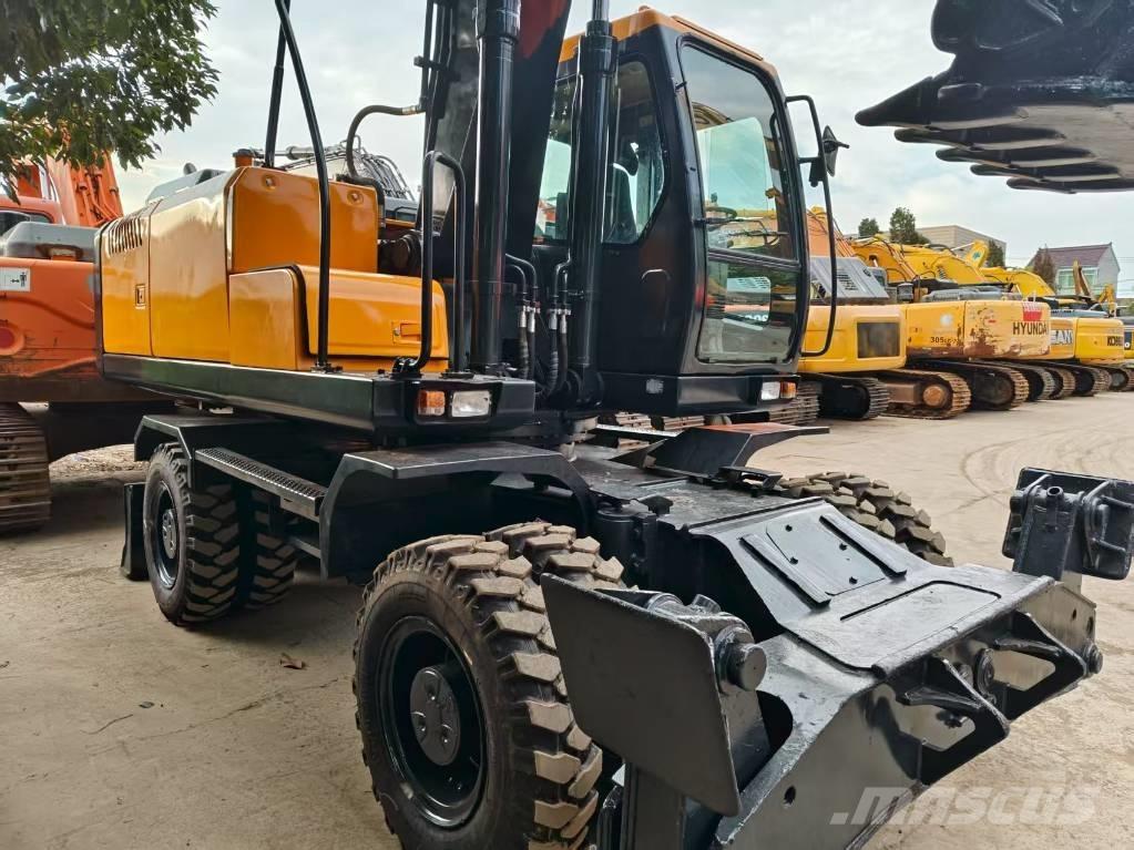 Hyundai R210w-9 حفارات بعجل