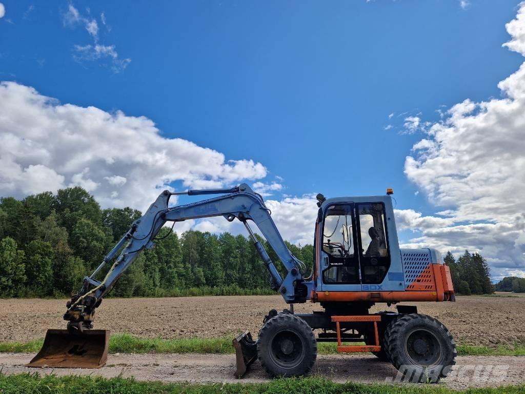 Takeuchi TB070w حفارات بعجل