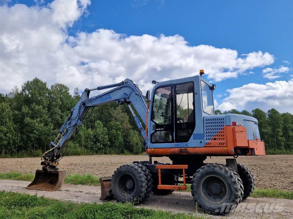Takeuchi TB070w حفارات بعجل