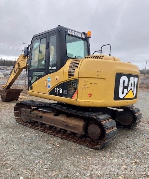 CAT 311 D حفارات زحافة