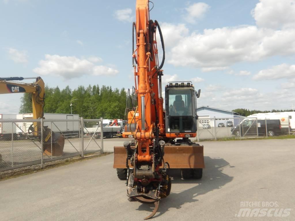 Doosan DX 160 W حفارات بعجل