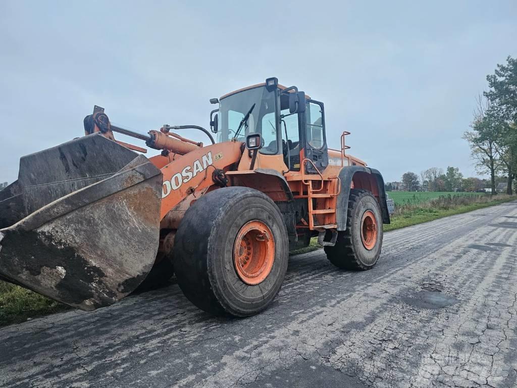 Doosan DL 400 2007r. لوادر ذات جرافات عكسية