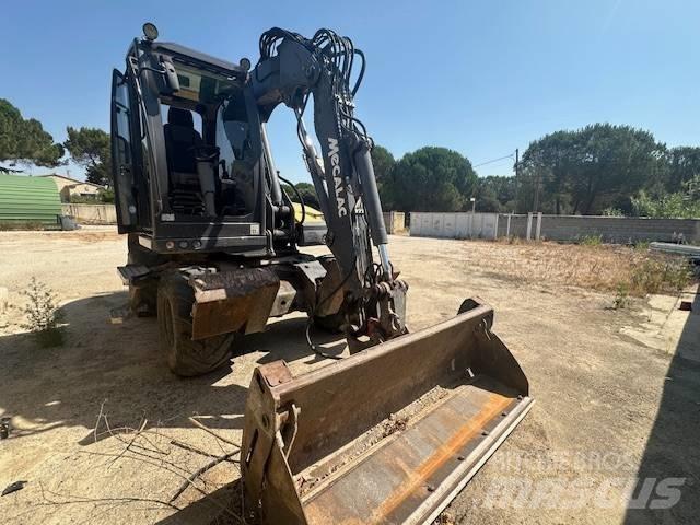 Mecalac 12 MTX حفارات بعجل