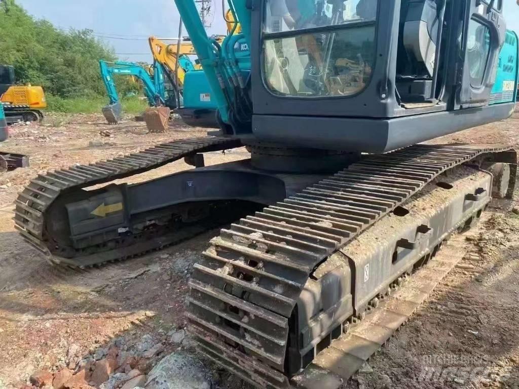 Kobelco SK 210 D حفارات زحافة