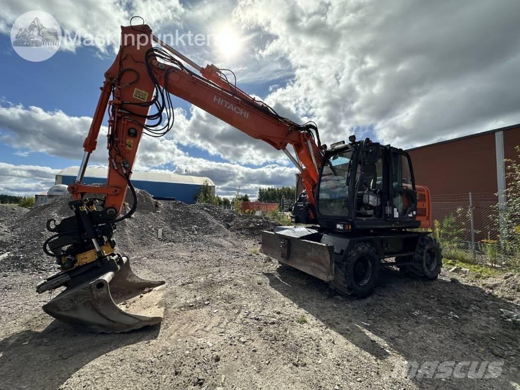 Hitachi ZX 140 W-5B حفارات بعجل