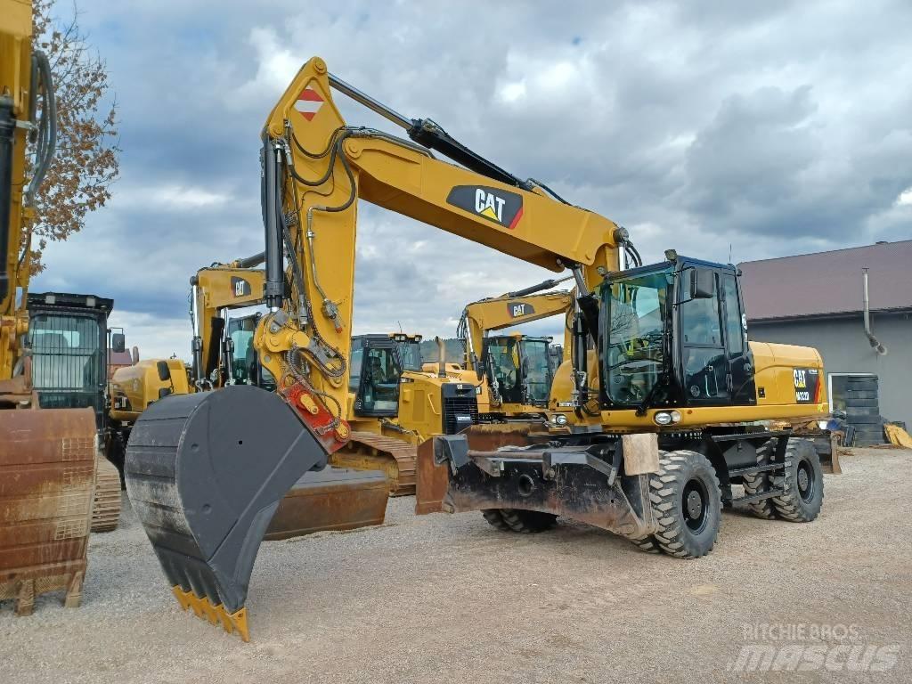 CAT M 322 D حفارات بعجل