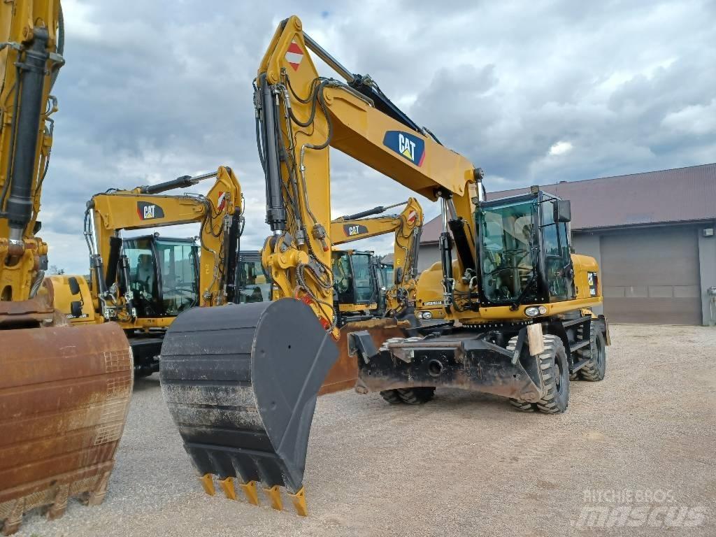 CAT M 322 D حفارات بعجل