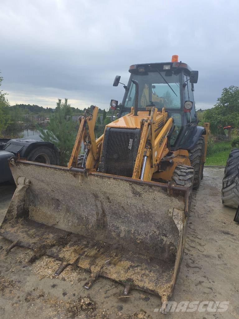CASE 580 لوادر ذات جرافات عكسية