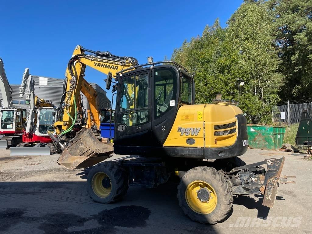 Yanmar B 95 W حفارات بعجل