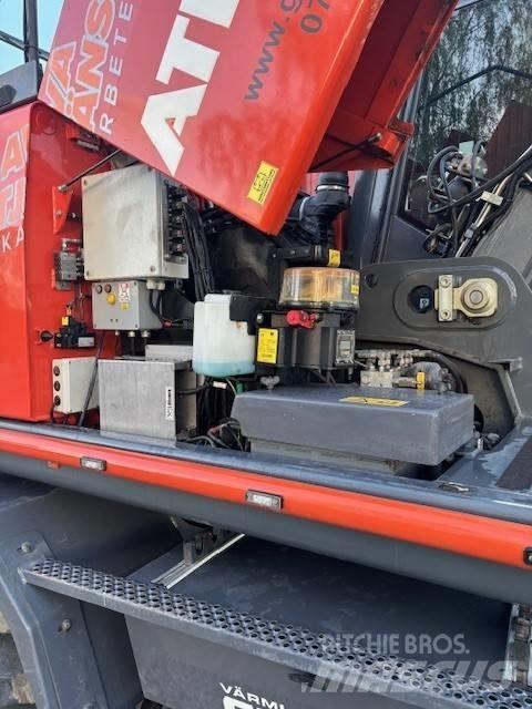 Atlas 160 W حفارات بعجل