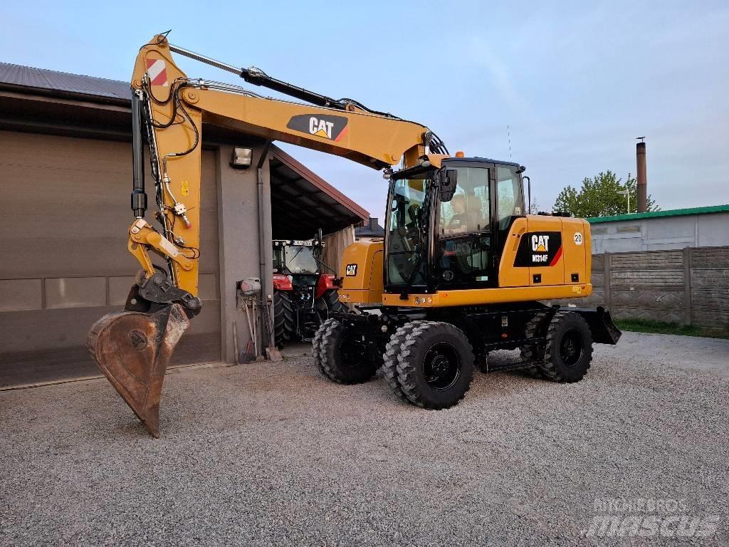 CAT 314 F حفارات بعجل