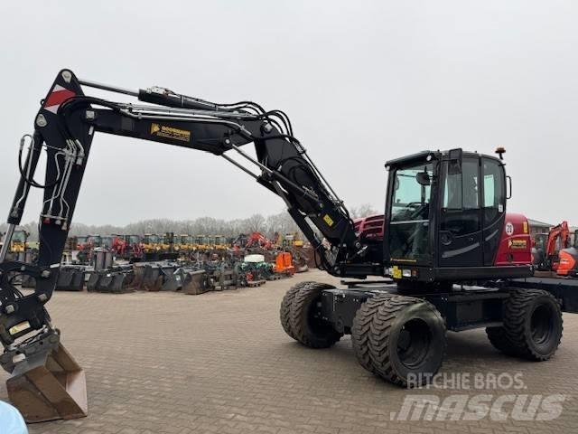Yanmar B 110 W حفارات بعجل