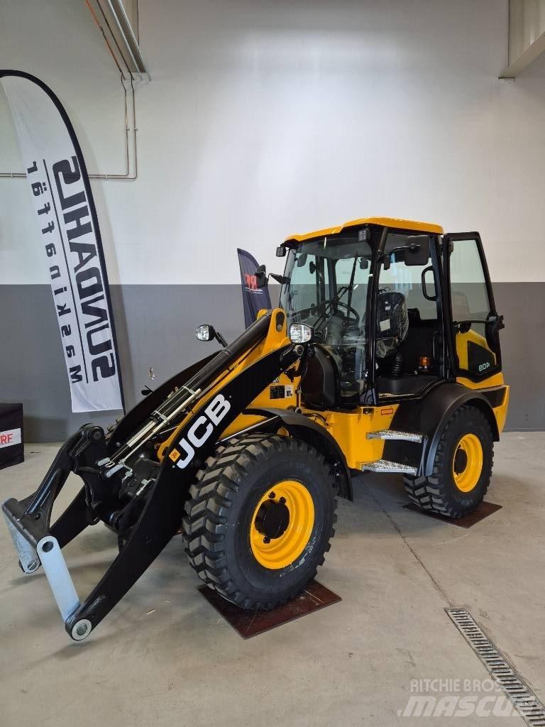 JCB 409 لوادر بعجل