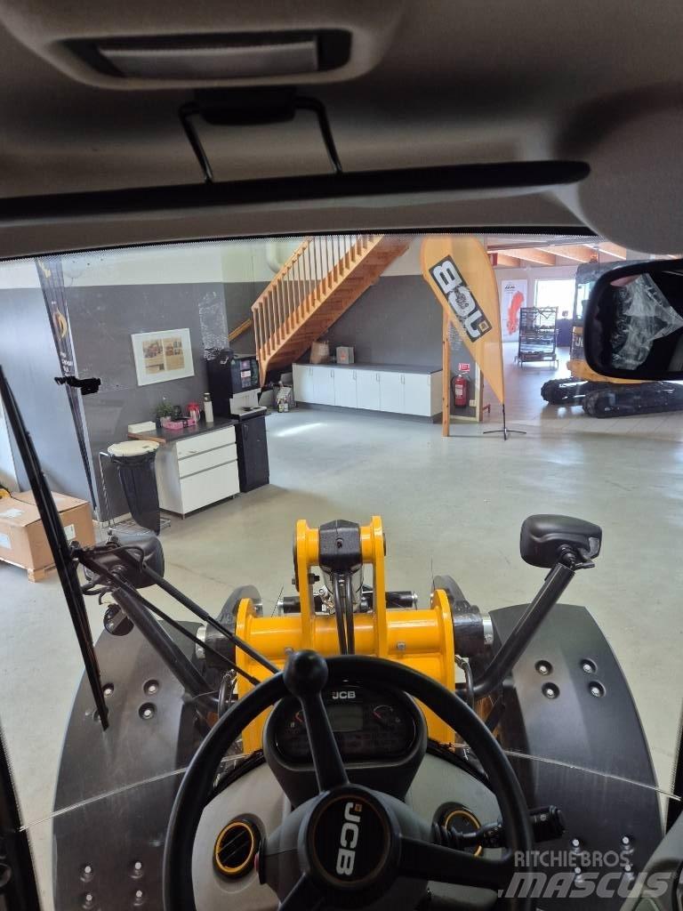 JCB 409 لوادر بعجل
