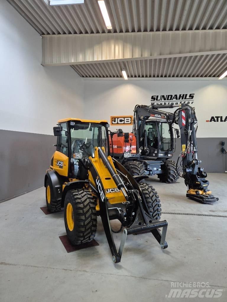 JCB 409 لوادر بعجل