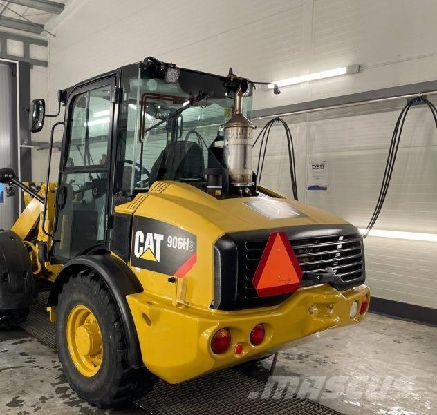 CAT 906 H 2 لوادر بعجل