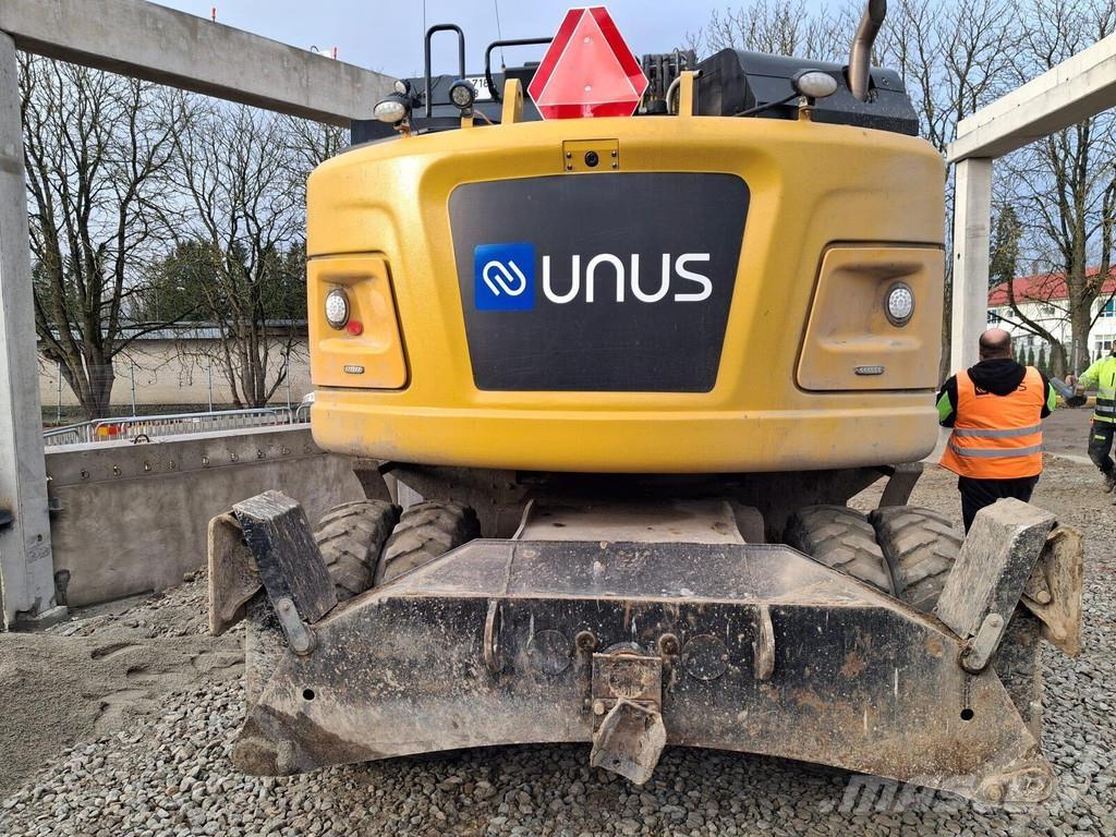 CAT M315F حفارات بعجل